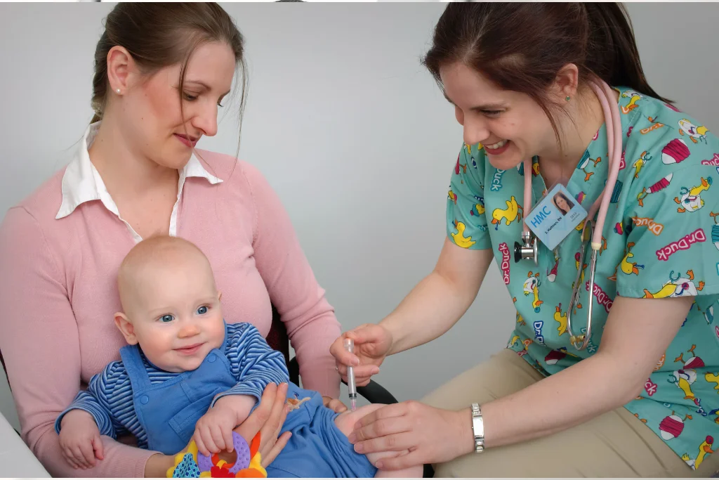 Pediatrics doctor talking to child